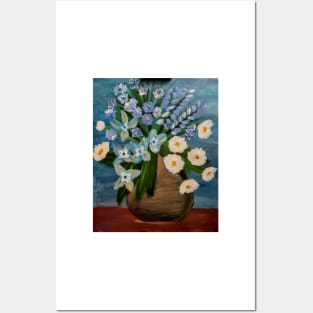 Some white daisy's and blue Bell and carnations flowers in a gold vase Posters and Art